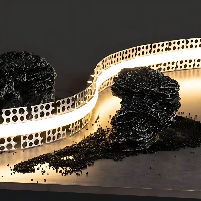 24-19 Đèn LED dây uốn dẻo màu vàng lắp trên thanh kim loại đục lỗ trang trí cạnh đá đen